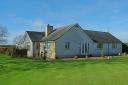 Solway Bungalow is a well-presented and spacious home with beautiful gardens and great views of countryside and fells