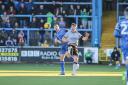 Sam Lavelle battles for the ball against Bristol Rovers