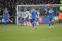 Reading celebrate Sam Smith's opener in their victory at Brunton Park