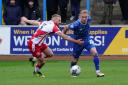 Dylan McGeouch in action against Stevenage
