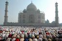 Muslims offer prayers in front of the Taj Mahal at Agra, India, to mark the end of Ramadan in 2006