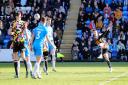 Jon Mellish superbly volleys home his third goal at Peterborough