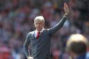 Arsenal manager Arsene Wenger bids farewell at Huddersfield (Mike Egerton/PA)