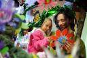 Artist Julian Longcake and daughter Tilia, five, put the finishing touches to a 'Recycle Tree' at Tullie House