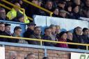 Lee Clark (fourth left) in the United directors' box, clost to co-owners John Nixon (second right) and Steven Pattison (third right)