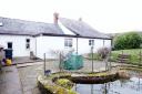 White Cottage in Longburgh is a listed 17th century Cumbrian longhouse with original and historic features