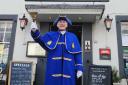 Brian Pease in his new coat and hat outside the Howard Arms Hotel