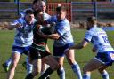 Workington Town v West Bowling. Town pile in for a tackle. Picture: Ben Challis
