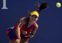 Emma Raducanu, of Great Britain, serves to Sara Sorribes Tormo, of Spain, during the third round of the US Open tennis championships, Saturday, Sept. 4, 2021, in New York. (AP Photo/Seth Wenig).
