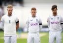 Ben Stokes, left, with team-mates Ollie Pope and Ben Foakes, observe a minute's silence for the Queen (photo: PA)