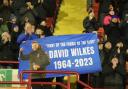 The flag in tribute to David Wilkes on show in the away end at Barnsley last week