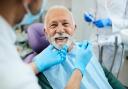 Who is eligible for free dental care in England?