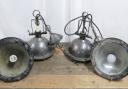 A set of 4 industrial pendant lights with galleries