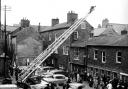 A fire rescue in Grapes Lane, Carlisle in 1966 attracted crowds of onlookers as the turntable ladder climbs above the rooftop
