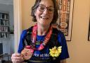 Jo Billett with her medal after completing the London Marathon