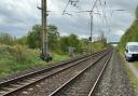 The damaged power lines over a section of the West Coast Main Line between Wigan and Preston
