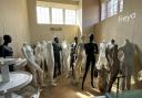 A room full of mannequins, all up for grabs in the auction