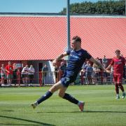 Ryan Edmondson fires home Carlisle's first goal (photos: Ben Holmes)