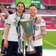 Gethin Jones, right, with the Papa John's Trophy, along with Bolton team-mate MJ Williams