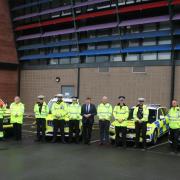 The Roads Policing Unit (RPU) at their launch event. Peter McCall (suit and tie, centre), the police, fire and crime commissioner for Cumbria, spoke alongside chief constable Rob Cardon (to his left) and RPU inspector Jack Stabler (left of Cardon).