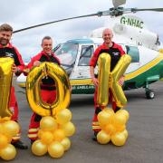 GNAAS critical care team with 10k balloons ahead of the raffle to raise funds