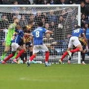 Conor Shaughnessy (No18) finds the net for Portsmouth in the final seconds