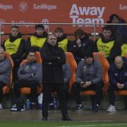 Paul Simpson on the touchline at Bloomfield Road