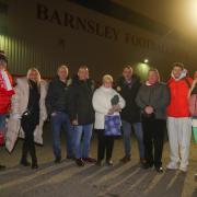 Members of David Wilkes' family (left to right) Neil Parker, Trudie Wilkes, Sean Wright, Glyn Wilkes, Margaret Wright, Bill Parker, Daniel Wilkes and Britney Marshall, plus Blues fan and author Pete Scholes (fourth from right) outside Oakwell last night