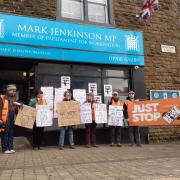 Protestors gathered outside Mark Jenkinson's office on March 15
