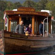 A family enjoys a trip on Windermere Lake Cruises’ vessel Princess of the Lake
