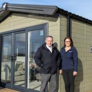 Karl Smalley, Director of Luxihomes and North Lakes Country Park, with Gemma Pudsey, Business Development Manager of Willerby, with the new all-electric Dorchester model at North Lakes.