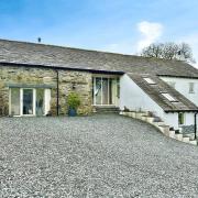 The four-bedroom barn conversion is listed for £575,000