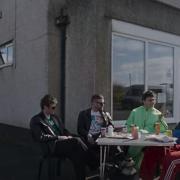 Fontaines DC outside in Grasslot Fish & Chip Shop in new video