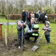 Care experienced ambassador Chloe Morely plants trees in Carlisle