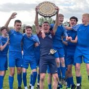 William Howard School's Year 10 football team lift the County Cup