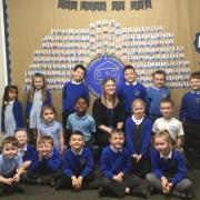 Headteacher Kirsty Rowell with pupils at St Gregory & St Patrick's Catholic Infant School