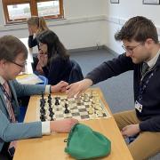 Holden Davies (right) is encouraging more students to feel benefits of playing chess