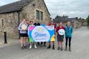 The staff are raising money for Shine