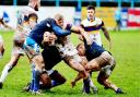 Taking some pulling down: Haven’s Callum Phillips is tackled by three defenders (Photos: Tom Kay)