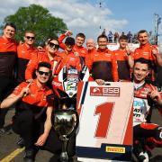 Glenn Irwin, front right, and the PBM team after their three victories at Oulton
