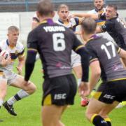 Black wall: Whitehaven's Callum Phillips looks for a way through the Thunder defence (Photos: John Story)