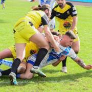 Four-pointer: Town’s Caine Barnes powers over to score against North Wales (Photo: Gary McKeating)