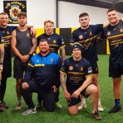 HAPPY: Councillor Walmsley and some of the players from Whitehaven