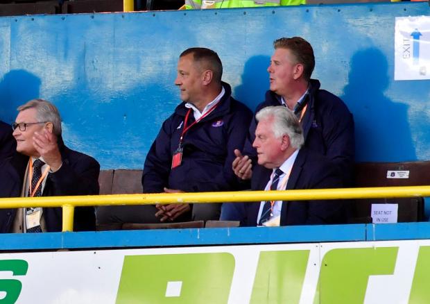 News and Star: Philip Day's (back right) EWM loaned United a seven-figure sum - and now Purepay have yet to give the Blues assurances they won't call the debt in (photo: Stuart Walker)