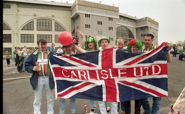 News and Star: United fans in their "deckchair" colours gather outside Wembley in 1995