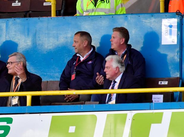 News and Star: Negotiations with Edinburgh Woollen Mill and other parties involving Philip Day (back right) did not lead to a takeover at Carlisle United (photo: Stuart Walker)