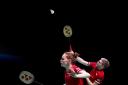 Up and over: Carlisle’s Lauren Smith in action with her mixed doubles partner Marcus Ellis