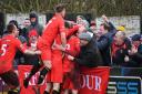 JOYOUS SCENES: Reds players celebrate Brad Carroll’s second goal with their fans at Kendal                        Ben Challis