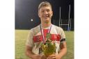 Logan Holgate with the European U19s trophy after the Lions win in Italy