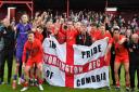 Workington Reds celebrate promotion after their victory over Runcorn Linnets